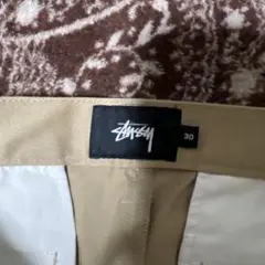 ベージュ チノパン