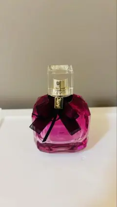 サンローランリボン付きピンクガラスボトル