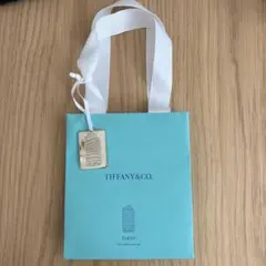 Tiffany ニューヨーク本店限定 紙袋とチャーム2個セット - メルカリ