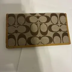 COACH コーチのシグネチャー柄の長財布