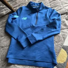 New Balance 青 ハーフジップジャージ