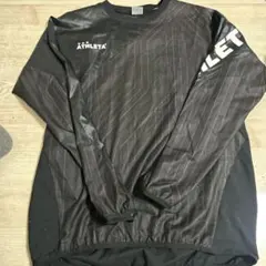 ATHLETA ブラック ピステ・ウィンドブレーカー