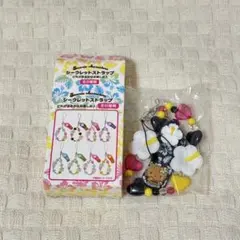 サンリオ　トコナツバケーション　シークレットストラップ　日焼けキティ　黒ver