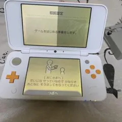 New 2DS LL ホワイト/オレンジ ステッカー付き