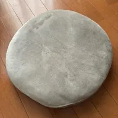 円形スエード調ベージュクッション