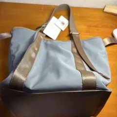 COOCO 青色と茶色のバッグのサムネイル