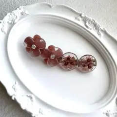 花モチーフ ピンク レジン ヘアクリップ