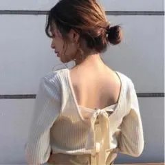 バックリボンニット
