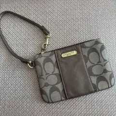 COACH ブロンズブラウン リストレット ポーチ