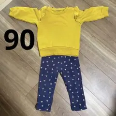 西松屋イエローフリルトップスとイオン花柄ネイビーパンツセット