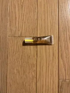 リップグロス 透明なゴールド