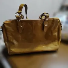 コーチ　イエロー エンボス加工 ハンドバッグ