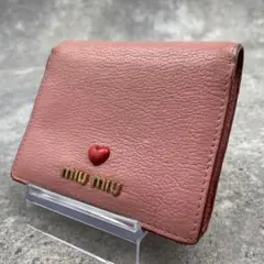 ミュウミュウ メタルロゴ マドラス ハート 折り財布 ピンク - メルカリ