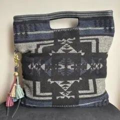 再値下げ アナザーエディション ウール クラッチバッグ