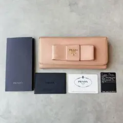 PRADA メタルロゴ　リボン　二つ折り長財布　サフィアーノレザー　ピンク