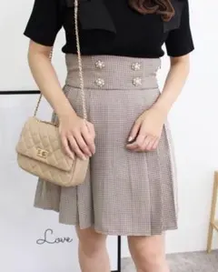 INGNI(イング) 装飾ボタンサイドプリーツスカート