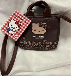 新品 日焼けキティ ハローキティ ミニポーチ リール付き