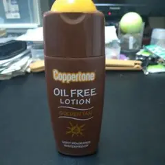 Coppertone オイルフリーローション ゴールデンタン 120ml残量半分のサムネイル