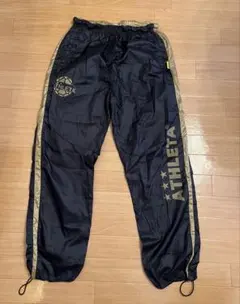 ATHLETA ナイロンパンツ ブラック ゴールド サッカー フットサル