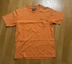 AIGLE オレンジ Tシャツ Mサイズ ポケット付きのサムネイル