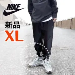 ☆新品タグ付☆ XL NIKE ビッグスウッシュ ウーブンパンツ　ブラック　黒 ナイキ スウッシュ ウーブン パンツ - メガスポーツ公式