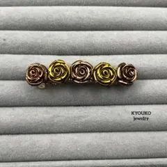 人工石　バラモチーフ バレッタ 金色と茶色