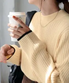 DISCOAT モチモチリブパイピングハイネック