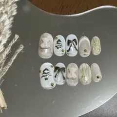 49 冬ネイル リボンネイル マグネットネイル クリスマスネイルショートオーバル