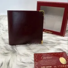 Cartier 二つ折り財布 バーガンディーのサムネイル