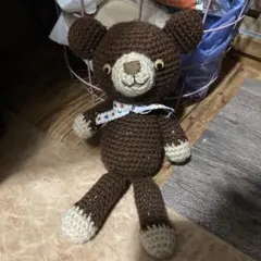 茶色のクマ型あみぐるみ