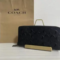 早い者勝ち！訳あり新品 COACH 長財布 エンボス加工 シグネチャー柄のサムネイル