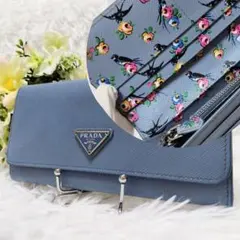 極美品✨プラダ♡RFID搭載　花ツバメフラップ長財布　三角ロゴ　水色シルバー金具