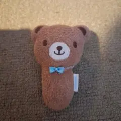 クマ型ラトル 茶色 青いリボン付き　ミキハウスのサムネイル