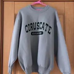 CORUSCATE ロゴ クルーネック ニット グレー
