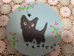 目が飛び出ている猫の絵