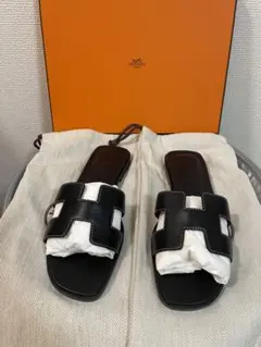 正規品Hermès サンダル ブラック スタッズHERMES 38.5裏張り済 - メルカリ