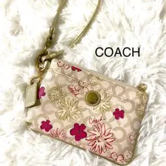 coach花柄ミニハンドポーチ