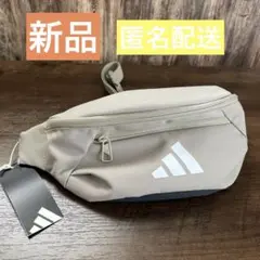 adidas ボディバッグ ベージュ