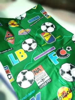 グリーンのサッカー柄の綿生地