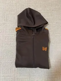 Needles トラックフーディー ブラウン×オレンジのサムネイル