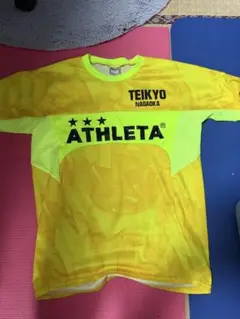 ATHLETA イエロー シャツ TEIKYO NAGADOKA