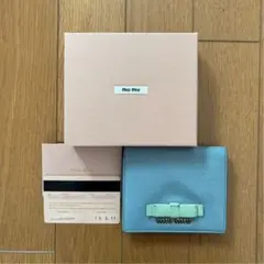 miu miu 水色 リボン付き二つ折り財布のサムネイル