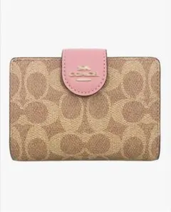 COACH 二つ折り財布 ピンク 並行輸入品:アウトレット品 - メルカリ