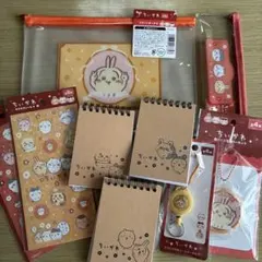 ちいかわ　うさぎ9点　フラットポーチ　リールキーホルダー　缶バッジ　シール