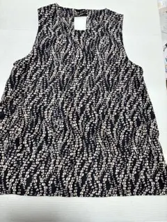 エプロン　黒地にベージュの模様　M〜L
