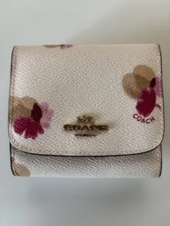 COACH 三つ折り財布 花柄 ホワイト 金属ロゴプレート レディース