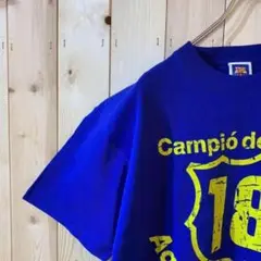 AE834 FCB BarcelonaプリントTブルー メンズ L ポス