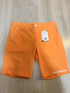 new balance ゴルフパンツ オレンジのサムネイル