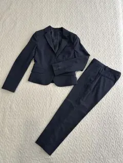 UNIQLO/ユニクロ　ネイビーストライプパンツスーツ収納カバー付き