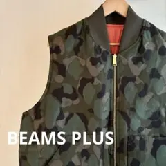 BEAMS PLUSのダックハンターカモ　リバーシブル ワーク パフ ベスト　L